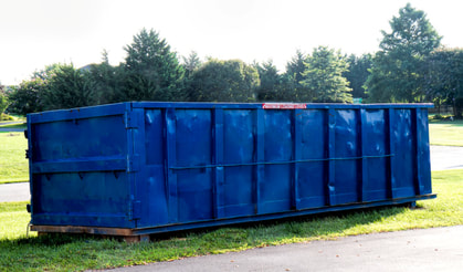 Large Blue  Dumpster in Urbana, Illinois